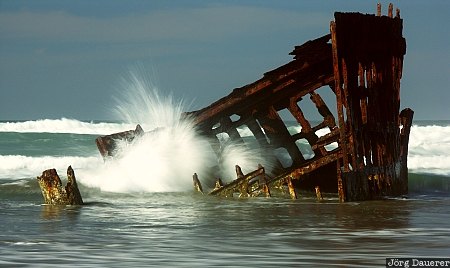 Wreck of Peter Iredale USA, Oregon, Fort Stevens State Park, coast, crashing wave, flowing water, pacific ocean